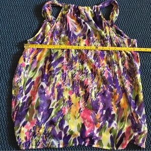 ABI sleeveless flowing shirt. Multi colored. Size  Medium